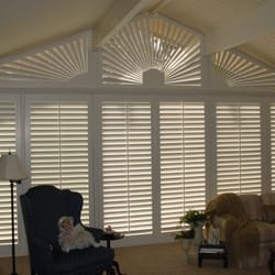 Gallery Shutters - Wall to wall, floor to ceiling, 4.5" shutters. Any shape is possible with Gallery Shutters, Inc.