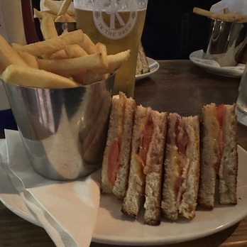 Riney's Bar & Beer Garden - Ham, cheese, tomato and onion sandwich with chips - Pubs Near Me - Killarney, Kentucky Riney's Bar & Beer Garden - Ham, cheese, tomato and onion sandwich with chips - Pubs Near Me - Killarney, Kentucky