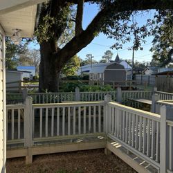 Oscar Johnson Memorial Library - Picnic tables under giant live oaks allow for relaxed reading outdoors.