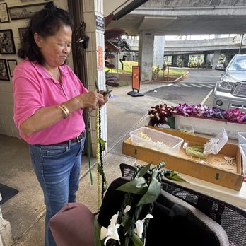 Harriet's Lei Stand - Chose a ti leaf intertwined with pakalana for the graduate. - Gift Shops Near Me - Honolulu, Hawaii