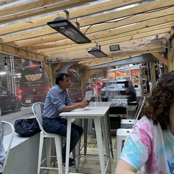 P.S. Kitchen - Outside dining area , high tops. - Vegetarian Near Me - New York, New York