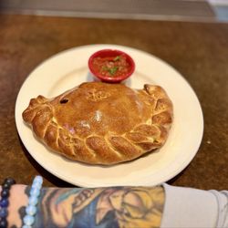 Old Chicago Pizza + Taproom - C7 calzone. Excellent, crispy crusty, plenty fillings & cheese. Dip is pizza sauce