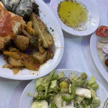 Hellas Restaurant - Side Greek salad. Bread w/ dipping oil. - Bakeries Near Me - Tarpon Springs, Florida