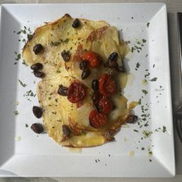 Roasted sea bass with thin potatoes