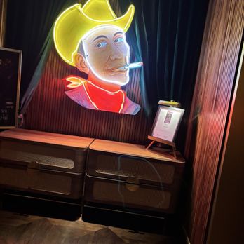 Stillwell's - Neon cowboy that greets you when you step off the elevator. - Steakhouses Near Me - Dallas, Texas Stillwell's - Neon cowboy that greets you when you step off the elevator. - Steakhouses Near Me - Dallas, Texas