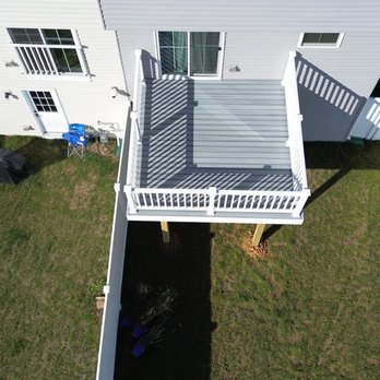 Leon Fence - drone or shot of white upper level deck in daylight - Fences & Gates Near Me - Hedgesville, West Virginia Leon Fence - drone or shot of white upper level deck in daylight - Fences & Gates Near Me - Hedgesville, West Virginia