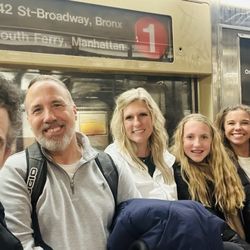 Real New York Tours - On the Subway with Luke, the great guide ever! All smiling faces from Oklahoma!
