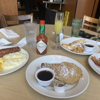 That Flippin' Egg - Sweet potato pancakes, grits, eggs, corned beef hash, orange and apple juice mimosas and French toast - New American Near Me - Evans, Georgia