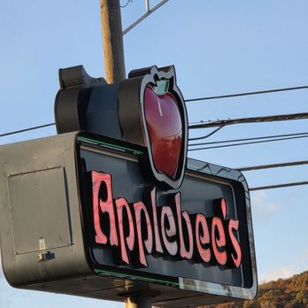 Applebee's Grill + Bar - Close-up of the parking lot sign of the restaurant. - American Near Me - Salem, Virginia