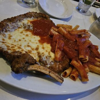Mario's Osteria - Veal chop parmesano. This was a disapointment.  Seems like they threw some sauce over it as an afterthought. - Italian Near Me - Boca Raton, Florida