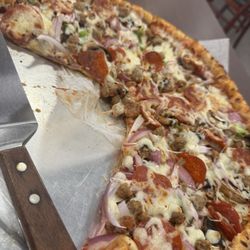Milano Greek & Italian - WHY IS THERE WATERY WAX PAPER UNDER MY PIZZA???