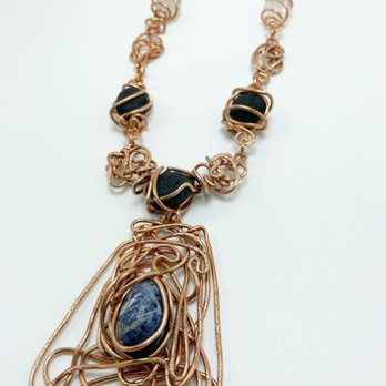 Cozmo El - Sodalite in Copper wrapping, Moorish Jewelry, Healing Stones, Gemstones, Chakra Healing - Spiritual Shop Near Me - Oakland, California Cozmo El - Sodalite in Copper wrapping, Moorish Jewelry, Healing Stones, Gemstones, Chakra Healing - Spiritual Shop Near Me - Oakland, California