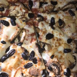 Pizza Hut - Mushroom, black olive, pineapple, and extra sauce.