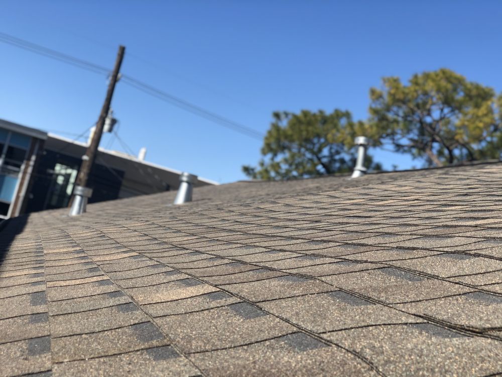 Slide of Pelican Roofing Group