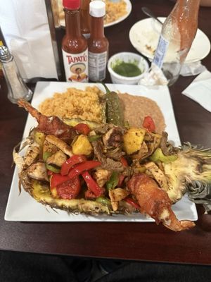 Mariscos y Sushi Tomateros by null