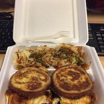 Judy's Cafe - The Cinnamon swirl sandwich w/ hash browns. I added bacon on the sandwich because I like the sausage and bacon combo. This a must try. - American Near Me - Garland, Texas