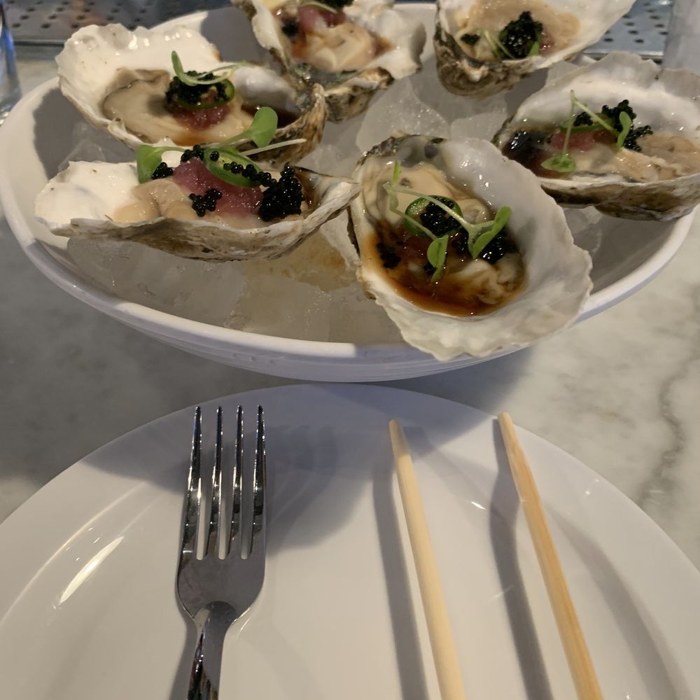 District One Kitchen and Bar - Raw Oysters with house sauce - Asian Fusion Near Me - Las Vegas, Nevada District One Kitchen and Bar - Raw Oysters with house sauce - Asian Fusion Near Me - Las Vegas, Nevada