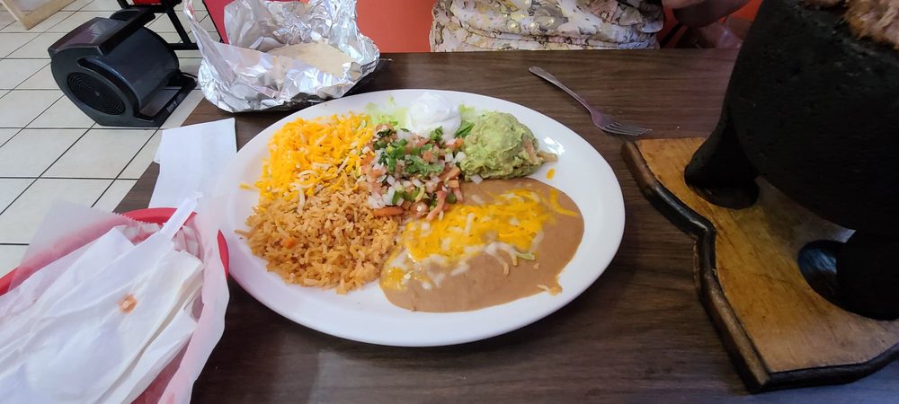 El Molcajete Restaurante Mexicano Logo