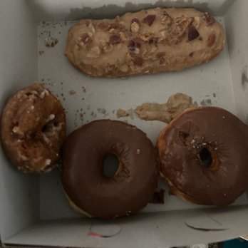 Golden Donuts - The lady put her bare finger in the chocolate dounut to the right of the picture - Donuts Near Me - National City, California Golden Donuts - The lady put her bare finger in the chocolate dounut to the right of the picture - Donuts Near Me - National City, California
