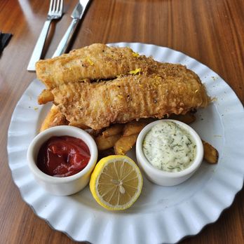 Oystercatchers - Fish and chips (garlic fries) - Seafood Near Me - Tampa, Florida Oystercatchers - Fish and chips (garlic fries) - Seafood Near Me - Tampa, Florida
