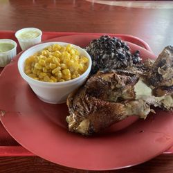 Half chicken with rice & beans, corn.