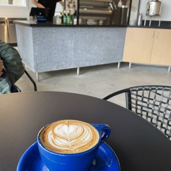 Endless Quest Roasters - a cappuccino in a blue cup - Coffee Roasteries Near Me - Laguna Beach, California Endless Quest Roasters - a cappuccino in a blue cup - Coffee Roasteries Near Me - Laguna Beach, California