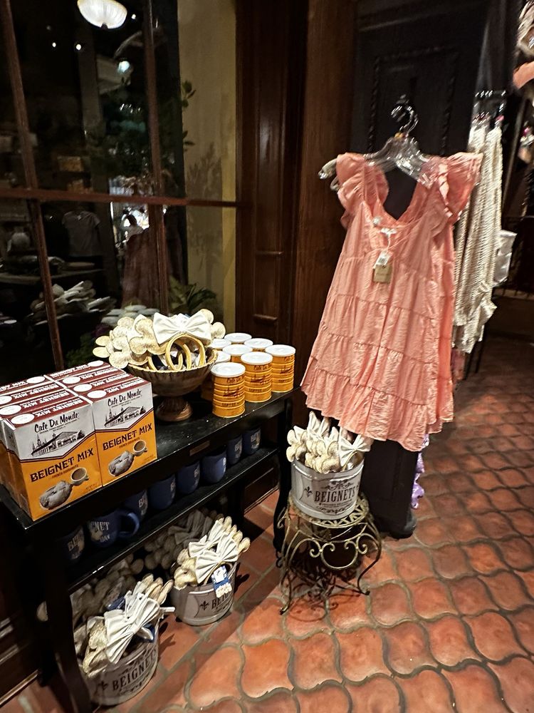 Eudora's Chic Boutique Featuring Tiana's Gourmet Secrets Logo