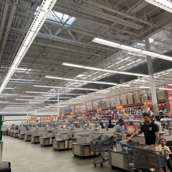 WinCo Foods - a man pushing a shopping cart in a grocery store - Grocery Near Me - Tacoma, Washington