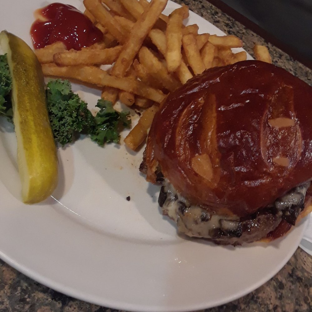 Pier Plaza Restaurant - Beef and Portabella Mushroom and Swiss with French fries. - American Near Me - Bayfield, Wisconsin Pier Plaza Restaurant - Beef and Portabella Mushroom and Swiss with French fries. - American Near Me - Bayfield, Wisconsin