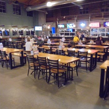 Invictus Brewing - View looking across the main room towards the bar. - Breweries Near Me - Blaine, Minnesota Invictus Brewing - View looking across the main room towards the bar. - Breweries Near Me - Blaine, Minnesota