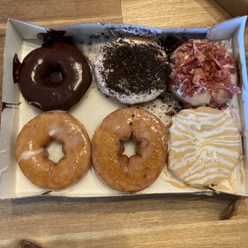 Duck Donuts - Two Glaze, Chocolate, Vanilla with Oreo, Maple Bacon, Banana Fluffer Nutter - Donuts Near Me - North Myrtle Beach, South Carolina Duck Donuts - Two Glaze, Chocolate, Vanilla with Oreo, Maple Bacon, Banana Fluffer Nutter - Donuts Near Me - North Myrtle Beach, South Carolina
