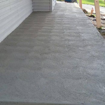 Labor Boys - Concrete Patio with signiture swirl finish. - Painters Near Me Labor Boys - Concrete Patio with signiture swirl finish. - Painters Near Me