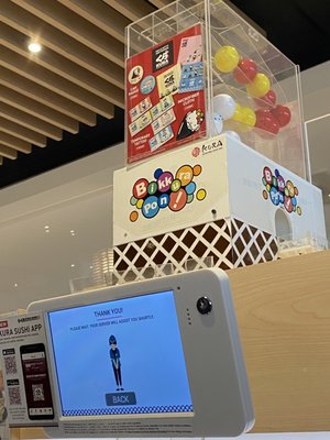 Kura Revolving Sushi Bar by null