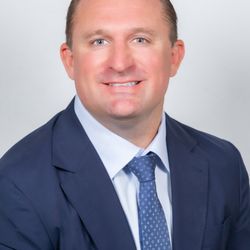 Specialists in Implant Dentistry - Dr. Matthew J Holtan