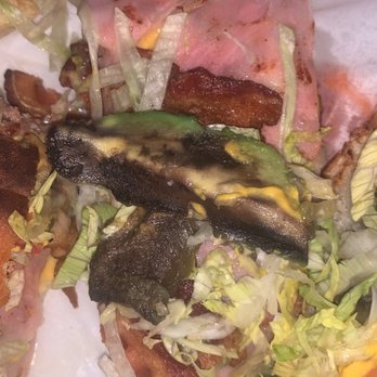 Taco Tacopeton - a close up of a sandwich - Tacos Near Me - Houston, Texas Taco Tacopeton - a close up of a sandwich - Tacos Near Me - Houston, Texas
