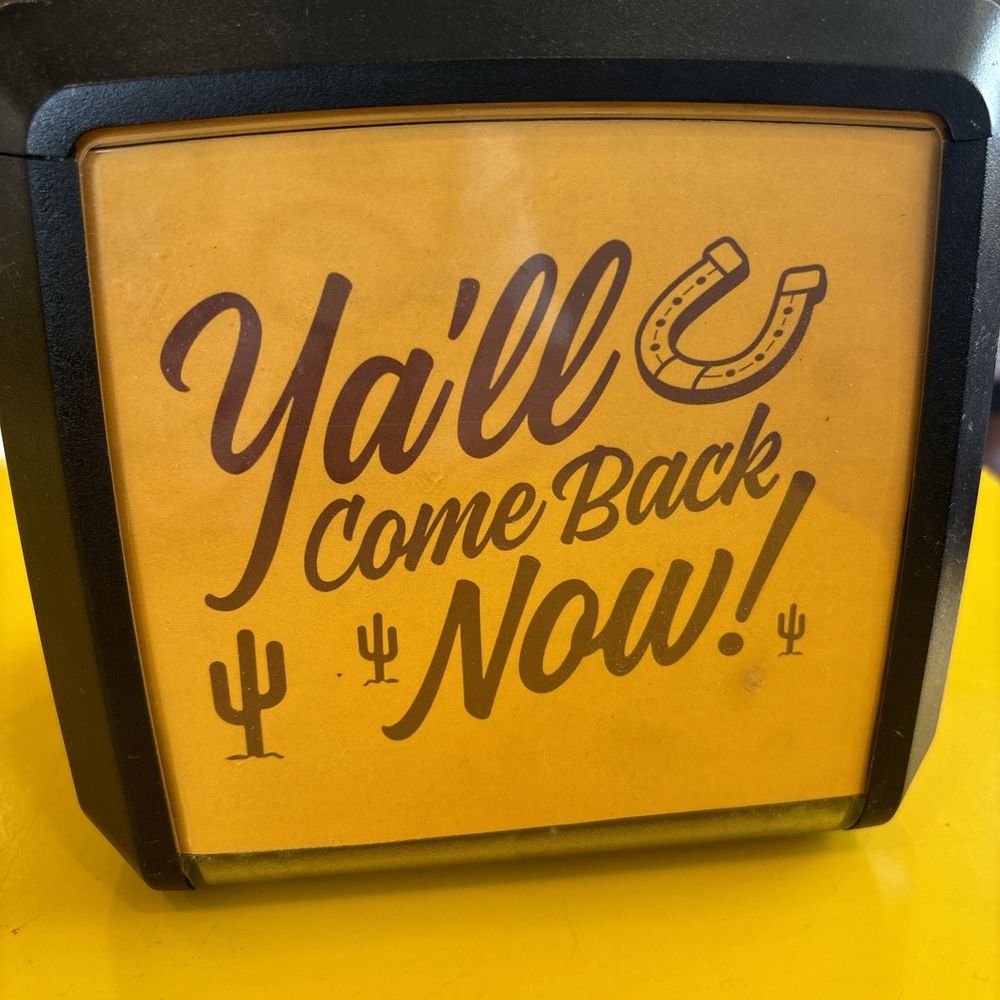 The napkin dispenser.