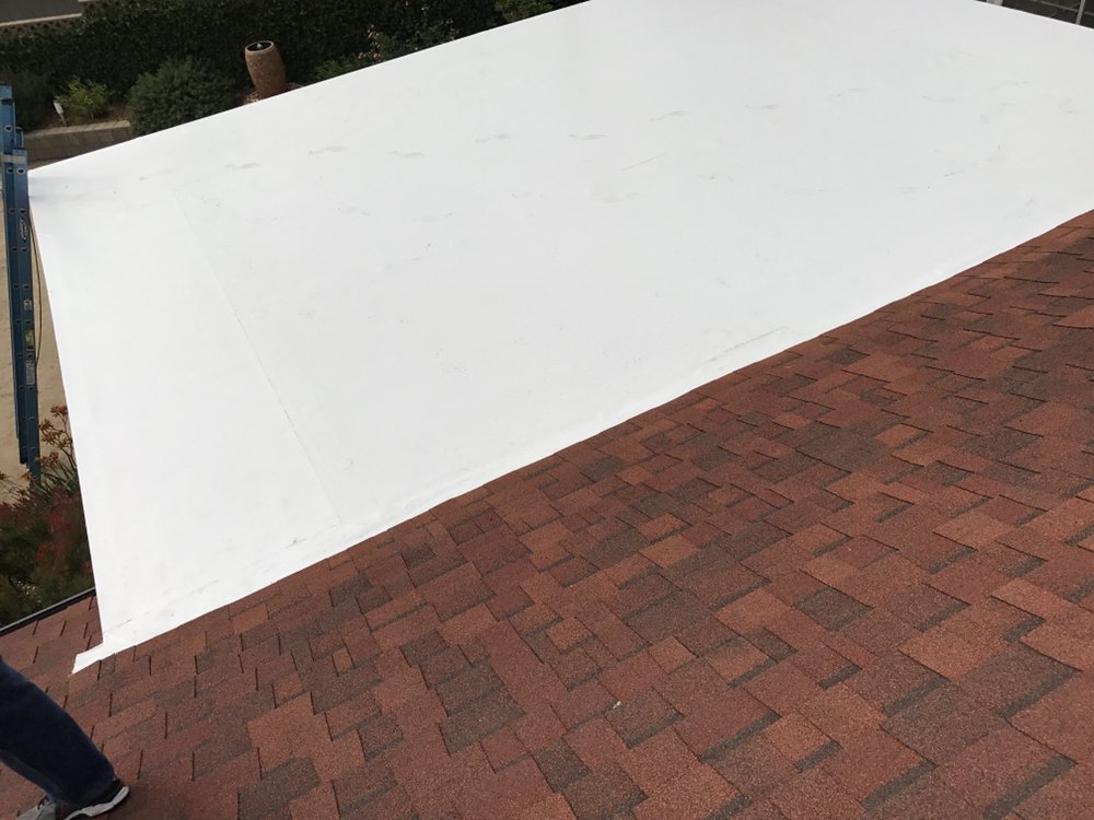 Slide of Espino Roofing