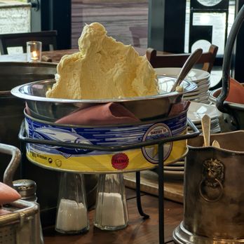 Esca - We spotted the grand butter bowl on the central table of the restaurant - Mediterranean Near Me - St. Louis, Missouri