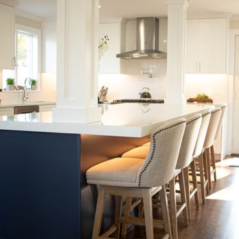 Matt Construction - a kitchen island with stools - General Contractors Near Me - Medford, Massachusetts