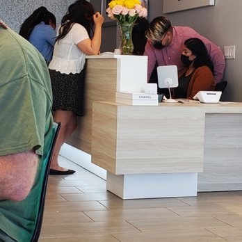 The Eye Doc at St.Rose - All 3 employees conferring on how to get us out of the store. - Optometrists Near Me - Henderson, Nevada The Eye Doc at St.Rose - All 3 employees conferring on how to get us out of the store. - Optometrists Near Me - Henderson, Nevada