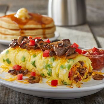 IHOP - a plate of breakfast food with pancakes - Breakfast & Brunch Near Me - Lilburn, Georgia