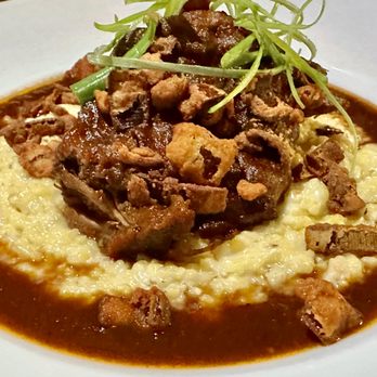 Hook & Hoof - Braised Short Rib with bleu cheese shagbark heirloom grits, BB "jus" sauce, fried leeks - New American Near Me - Willoughby, Ohio Hook & Hoof - Braised Short Rib with bleu cheese shagbark heirloom grits, BB "jus" sauce, fried leeks - New American Near Me - Willoughby, Ohio