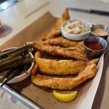 Tricky Fish - Fried catfish platter with fried okra and coleslaw. Okra is amazing. - Seafood Near Me - Frisco, Texas Tricky Fish - Fried catfish platter with fried okra and coleslaw. Okra is amazing. - Seafood Near Me - Frisco, Texas