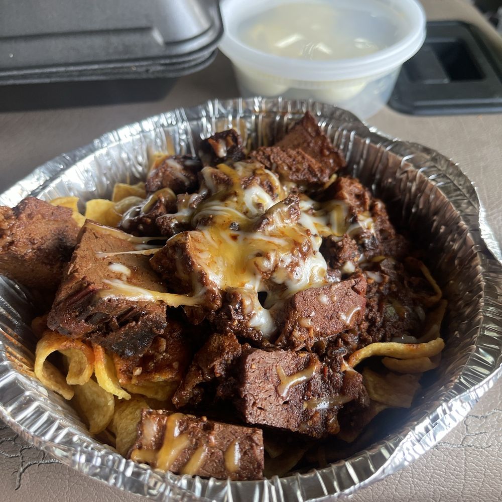 I paid $16 for this little itty-bitty Frito pie. Don't go here people save your money. I paid $16 for this little itty-bitty Frito pie. Don't go here people save your money.