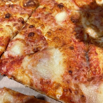 Pizza Garden Main - a slice taken out of a pizza - Pizza Near Me - Vancouver, British Columbia Pizza Garden Main - a slice taken out of a pizza - Pizza Near Me - Vancouver, British Columbia