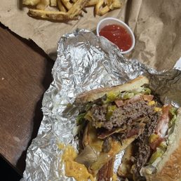 Regular fries and double bacon cheeseburger with the works Regular fries and double bacon cheeseburger with the works