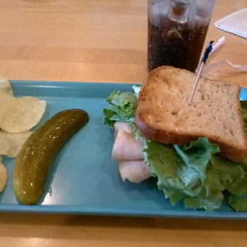 Falling Rock Cafe and Book Store - Turkey on gluten free bread with chips and pickle. - Bookstores Near Me - Munising, Michigan Falling Rock Cafe and Book Store - Turkey on gluten free bread with chips and pickle. - Bookstores Near Me - Munising, Michigan