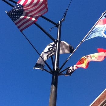 J&M Tap - the flag of the united states flying in the wind - Sports Bars Near Me - Chicago, Illinois J&M Tap - the flag of the united states flying in the wind - Sports Bars Near Me - Chicago, Illinois