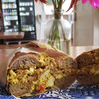 Breadhive Bakery & Cafe - Vegan Shania bkfst sandwich ($6). Great bagel. Tofu scramble & tempeh were nothing to rave about. Would be better w/seitan bacon & avocado. - Cafes Near Me - Buffalo, New York Breadhive Bakery & Cafe - Vegan Shania bkfst sandwich ($6). Great bagel. Tofu scramble & tempeh were nothing to rave about. Would be better w/seitan bacon & avocado. - Cafes Near Me - Buffalo, New York