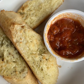 Noodles and Company - Three of the remaining garlic cheese bread - Noodles Near Me - Murray, Utah Noodles and Company - Three of the remaining garlic cheese bread - Noodles Near Me - Murray, Utah